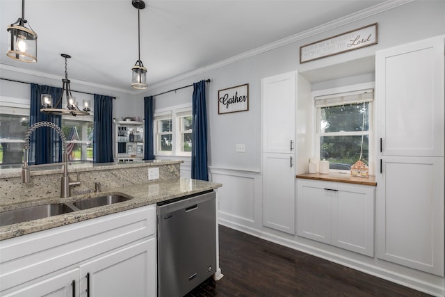 2610 Westover Blvd, Des Moines, IA 50322 - kitchen featuring dishwasher, crown molding, dark wood-style floors, white cabinets, and healthy amount of natural light