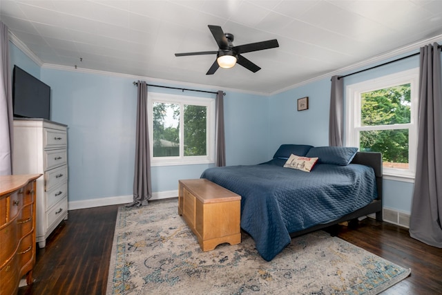 2610 Westover Blvd, Des Moines, IA 50322 - bedroom with dark wood finished floors, multiple windows, ornamental molding, and ceiling fan