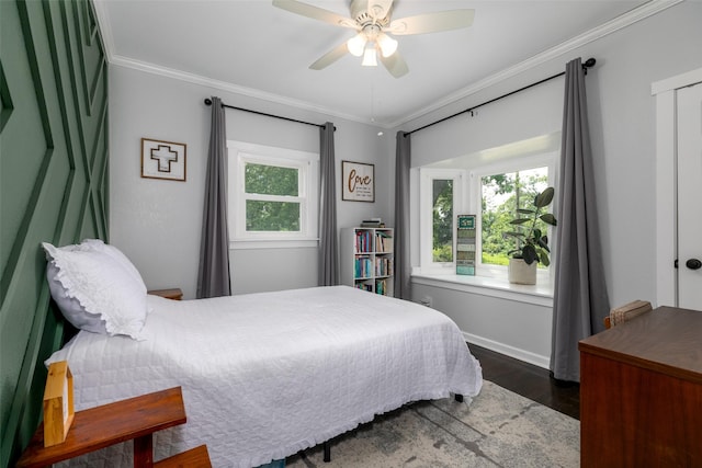 2610 Westover Blvd, Des Moines, IA 50322 - bedroom featuring wood finished floors, ornamental molding, and a ceiling fan