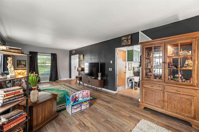 1416 Clinton Ave, Des Moines, IA 50313 - living area with wood finished floors