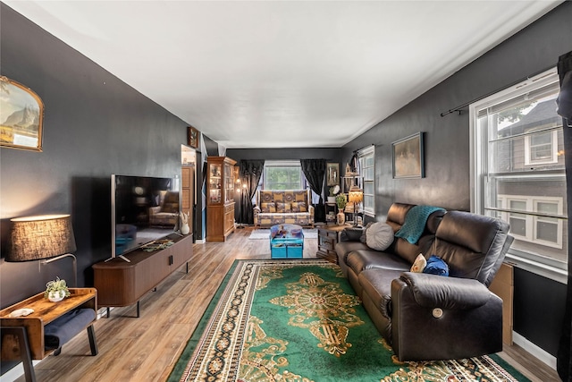 1416 Clinton Ave, Des Moines, IA 50313 - living area with light wood finished floors