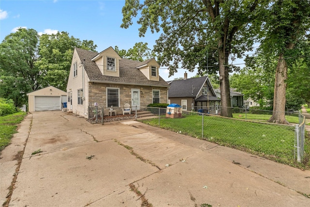 1416 Clinton Ave, Des Moines, IA 50313 - new england style home with concrete driveway, a detached garage, stone siding, an outdoor structure, and roof with shingles