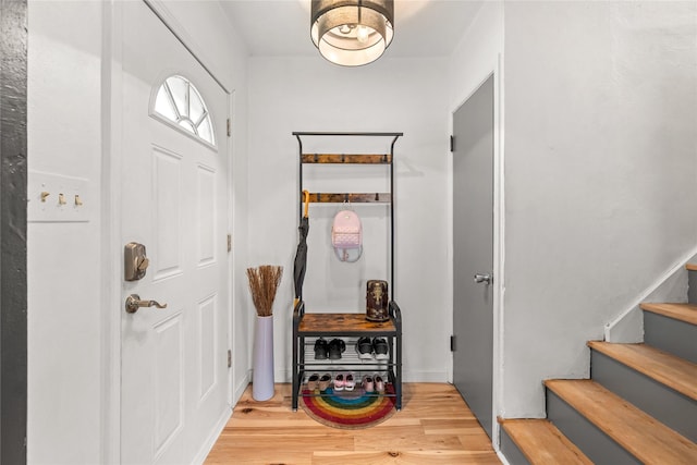 1416 Clinton Ave, Des Moines, IA 50313 - entryway featuring wood finished floors and stairway