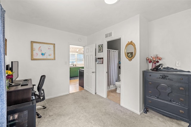 1416 Clinton Ave, Des Moines, IA 50313 - office featuring light colored carpet and a sink