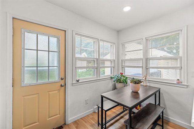 1416 Clinton Ave, Des Moines, IA 50313 - dining space featuring light wood finished floors and recessed lighting