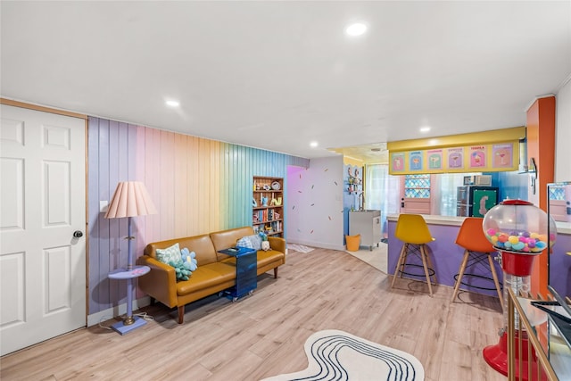 1416 Clinton Ave, Des Moines, IA 50313 - living room featuring wood finished floors and recessed lighting