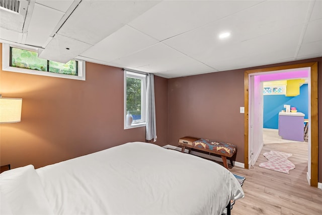 1416 Clinton Ave, Des Moines, IA 50313 - bedroom featuring light wood-style floors and baseboards