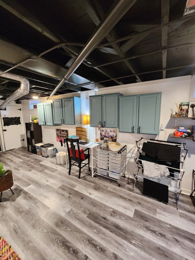 2904 48th St, Des Moines, IA 50310 - finished basement with wood finished floors