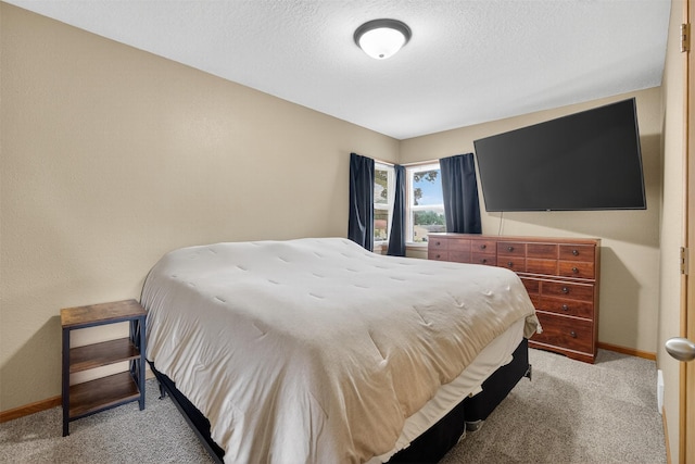 8026 Crestview Dr, Des Moines, IA 50320 - bedroom featuring light colored carpet and a textured ceiling