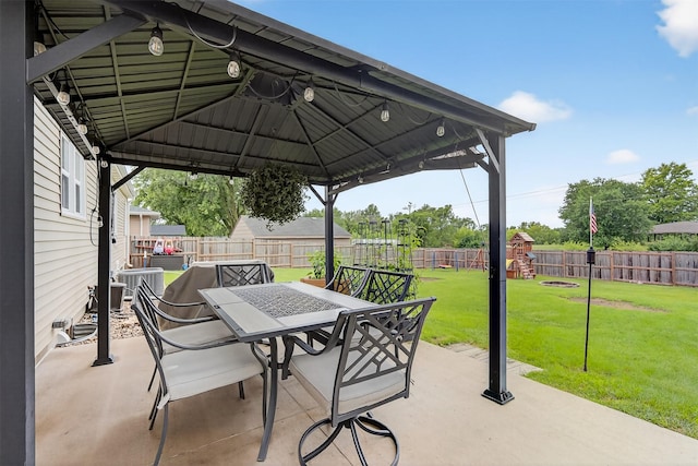 8026 Crestview Dr, Des Moines, IA 50320 - fenced backyard with outdoor dining area, a gazebo, and a patio