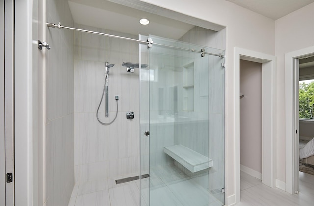 605 S Tiburon Cv, West Des Moines, IA 50266 - bathroom with a shower stall