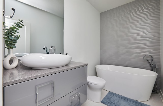 605 S Tiburon Cv, West Des Moines, IA 50266 - full bath with a freestanding tub, vanity, and tile patterned flooring