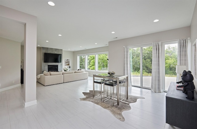 605 S Tiburon Cv, West Des Moines, IA 50266 - dining area with a fireplace and recessed lighting