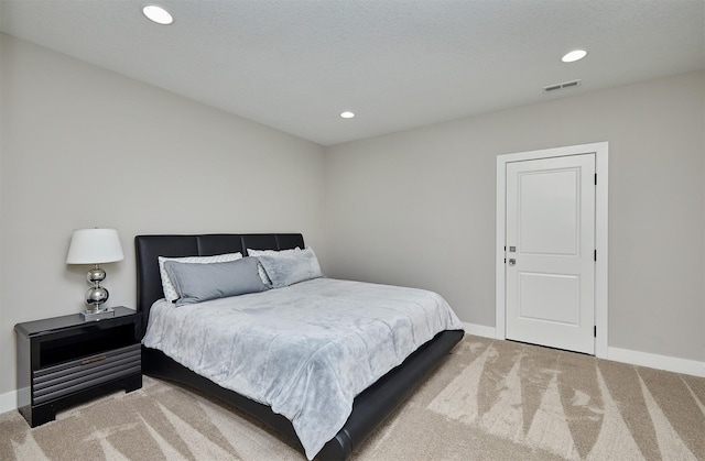 605 S Tiburon Cv, West Des Moines, IA 50266 - carpeted bedroom with baseboards and recessed lighting