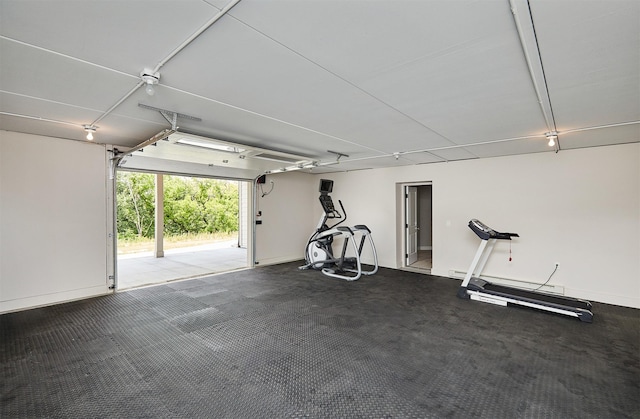 605 S Tiburon Cv, West Des Moines, IA 50266 - garage featuring baseboards