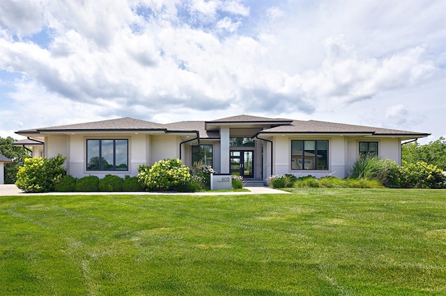605 S Tiburon Cv, West Des Moines, IA 50266 - prairie-style house featuring stucco siding and a front lawn