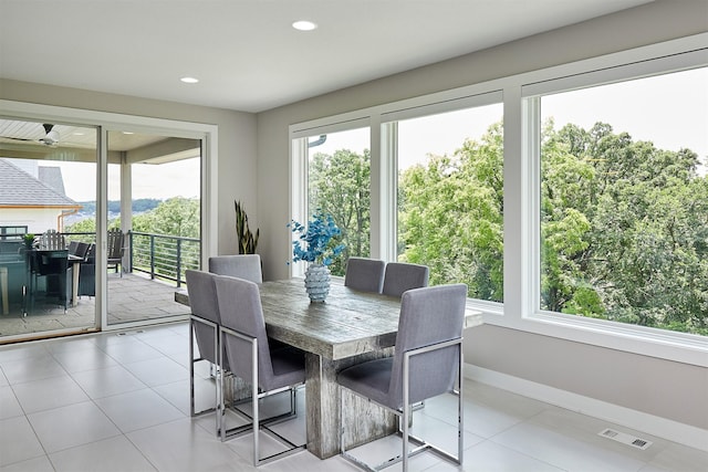 605 S Tiburon Cv, West Des Moines, IA 50266 - dining space with recessed lighting and light tile patterned floors