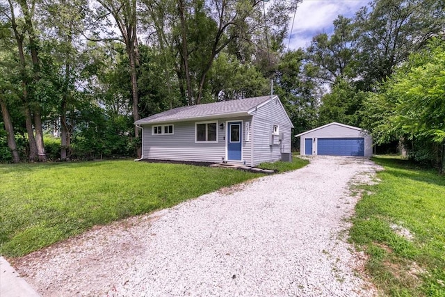 2311 Williams St, Des Moines, IA 50317 - single story home with an outdoor structure, a garage, a front yard, and entry steps