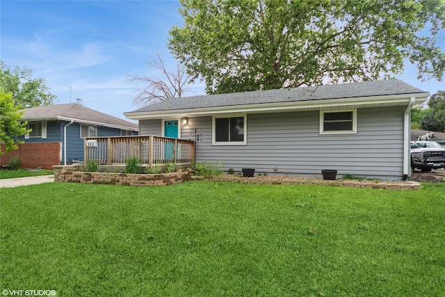 214 SW Scott St, Ankeny, IA 50023 - back of house featuring a yard, a deck, and a shingled roof