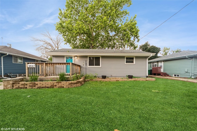 214 SW Scott St, Ankeny, IA 50023 - back of property featuring a wooden deck and a yard