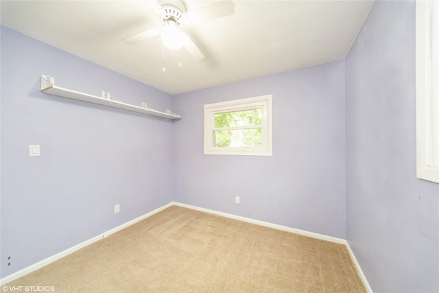 214 SW Scott St, Ankeny, IA 50023 - spare room with a ceiling fan and carpet floors