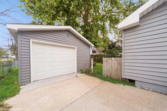 214 SW Scott St, Ankeny, IA 50023 - detached garage featuring concrete driveway