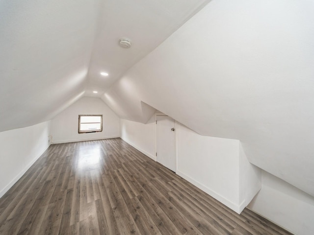 1534 9th St, Des Moines, IA 50314 - bonus room featuring dark wood finished floors and lofted ceiling