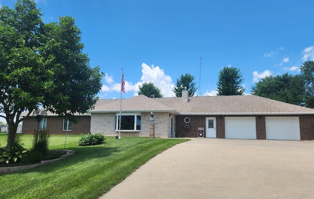 1439 N Shore Dr, Knoxville, IA 50138 - ranch-style house featuring a garage, concrete driveway, a front lawn, brick siding, and a chimney