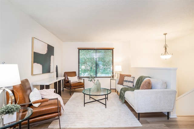 3600 E 42nd Ct, Des Moines, IA 50317 - living room featuring light wood finished floors and baseboards