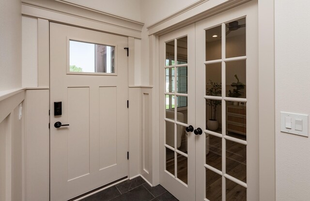 519 16th Avenue Ct SE, Altoona, IA 50009 - foyer entrance featuring french doors and dark tile patterned flooring