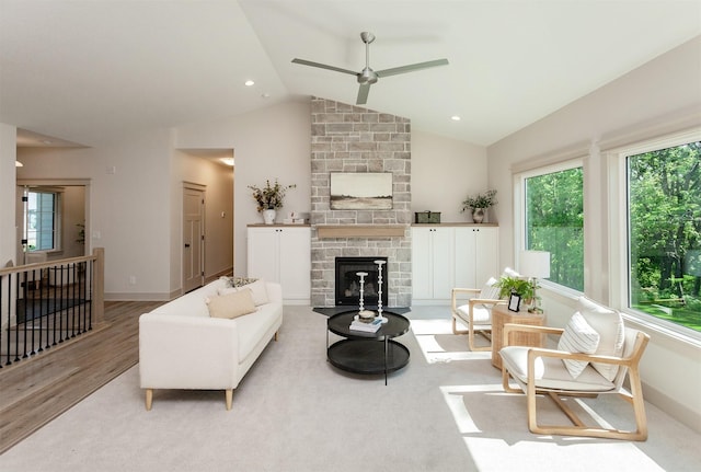 519 16th Avenue Ct SE, Altoona, IA 50009 - living area featuring a ceiling fan, healthy amount of natural light, a stone fireplace, high vaulted ceiling, and recessed lighting