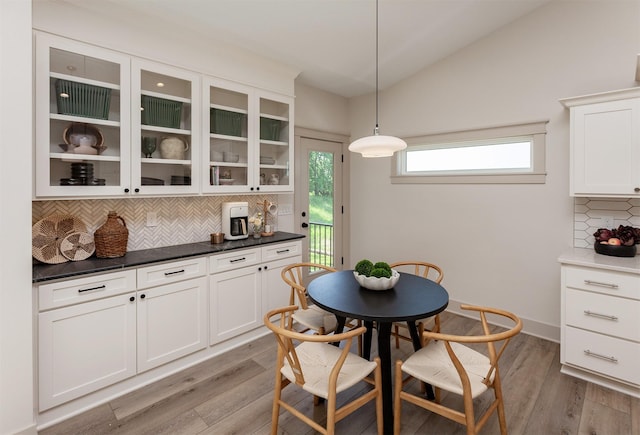 519 16th Avenue Ct SE, Altoona, IA 50009 - dining space featuring light wood-style floors and lofted ceiling