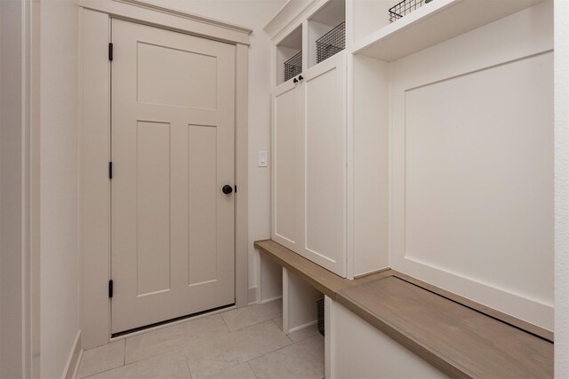 519 16th Avenue Ct SE, Altoona, IA 50009 - mudroom with light tile patterned flooring and baseboards