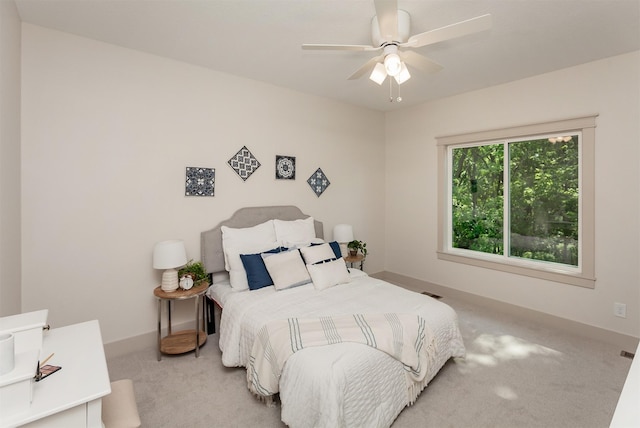 519 16th Avenue Ct SE, Altoona, IA 50009 - bedroom featuring light colored carpet and a ceiling fan