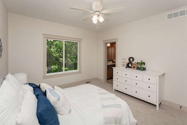 519 16th Avenue Ct SE, Altoona, IA 50009 - bedroom with light carpet and a ceiling fan