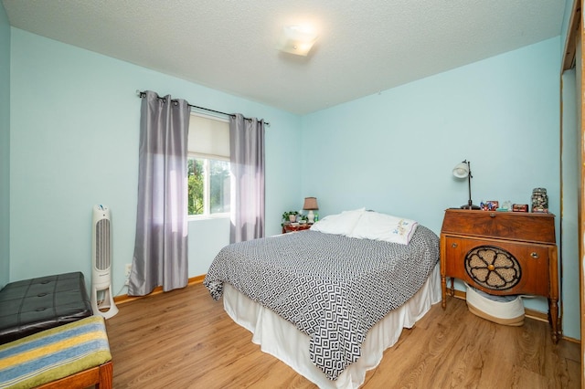 9102 NW Windsor Dr, Johnston, IA 50131 - bedroom with wood finished floors