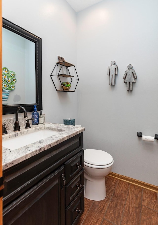 5526 Kensington Cir, Johnston, IA 50131 - half bathroom with vanity and wood finished floors