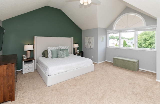5526 Kensington Cir, Johnston, IA 50131 - carpeted bedroom featuring vaulted ceiling and ceiling fan