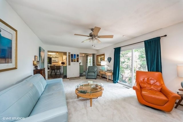 4505 75th St, Urbandale, IA 50322 - carpeted living room featuring ceiling fan