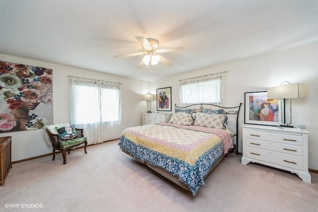 4505 75th St, Urbandale, IA 50322 - bedroom featuring light colored carpet and ceiling fan