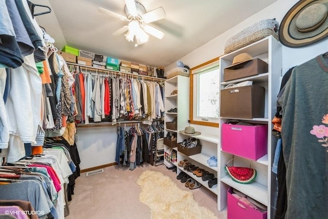 4505 75th St, Urbandale, IA 50322 - spacious closet with carpet floors and a ceiling fan