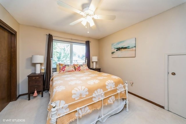 4505 75th St, Urbandale, IA 50322 - bedroom with light carpet, ceiling fan, and a closet