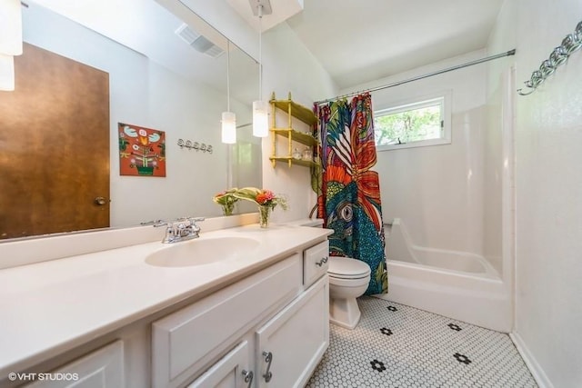 4505 75th St, Urbandale, IA 50322 - full bathroom featuring vanity, shower / tub combo, and tile patterned flooring