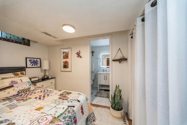 4505 75th St, Urbandale, IA 50322 - bedroom with ensuite bath and a sink
