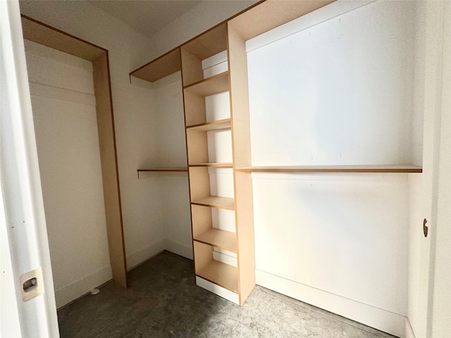 880 Harrington Way, Waukee, IA 50263 - spacious closet featuring carpet flooring