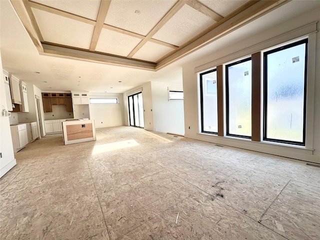 880 Harrington Way, Waukee, IA 50263 - unfurnished living room with coffered ceiling
