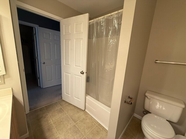 244 4th Ave W, Grinnell, IA 50112 - bathroom featuring vanity and shower / tub combo with curtain