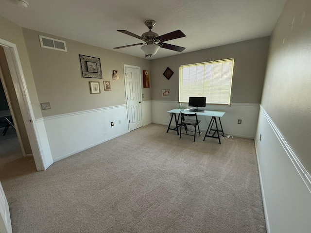 244 4th Ave W, Grinnell, IA 50112 - carpeted office space featuring a ceiling fan