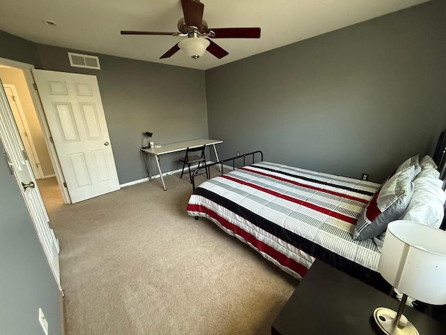 244 4th Ave W, Grinnell, IA 50112 - carpeted bedroom with ceiling fan
