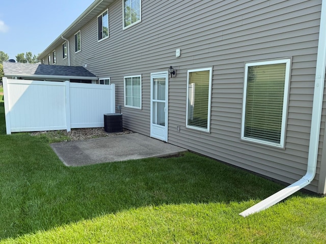 244 4th Ave W, Grinnell, IA 50112 - rear view of property featuring a patio